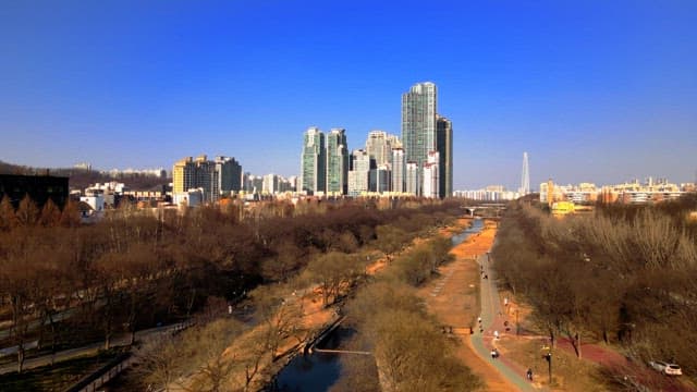 Cityscape with skyscrapers and a river
