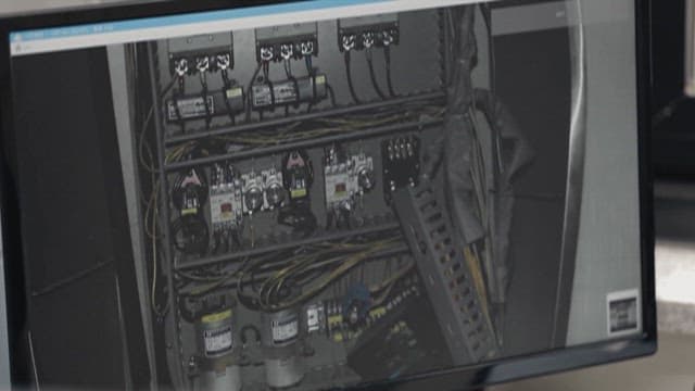 Photo of the machine's wiring on a computer screen