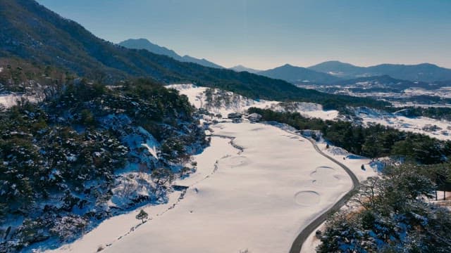 Tranquil Snow-covered Mountains and Valley