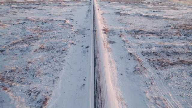 Car driving on a snowy road