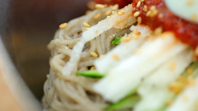 Spicy buckwheat noodles with vegetables and seasoning sauce