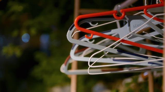 Colorful hangers hanging outdoors