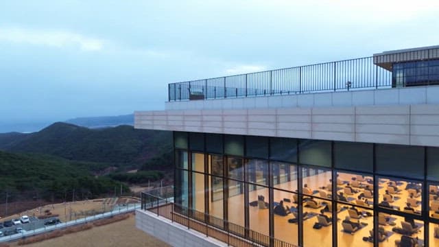 Serene evening meditation class inside a modern building