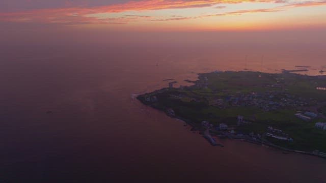 Serene coastal landscape at sunset