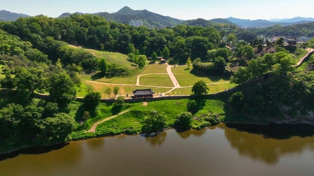 Lush green park with a traditional pavilion