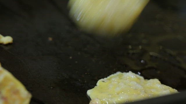 Placing the Octopus Pancake Batter on an Oiled Pan