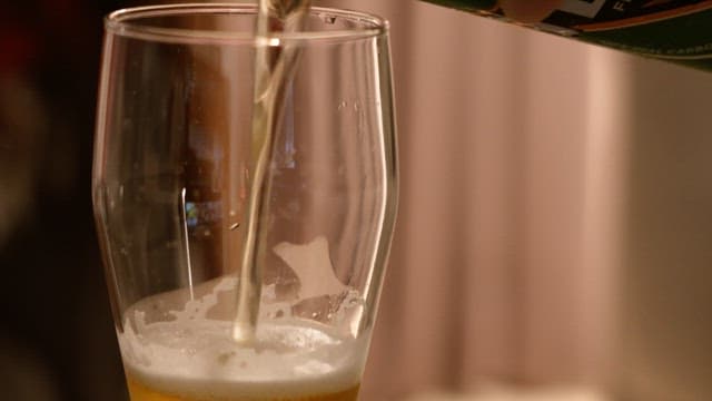 Pouring Beer into a Glass
