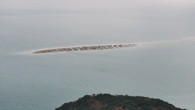 White Sandbank in the Middle of the Sea