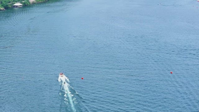 Water skiing on a scenic river