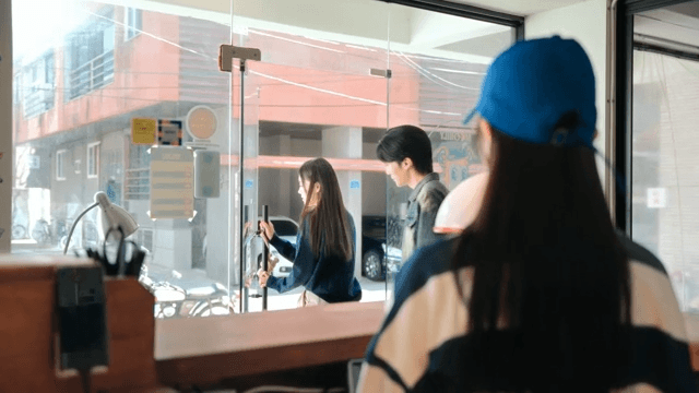 Customers leaving the pizzeria