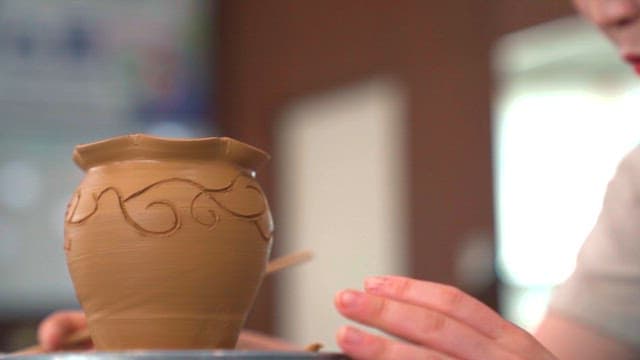 Person who Delicately Engraves Patterns on Ceramics