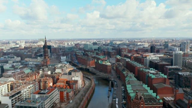Daytime scene of a city with a canal