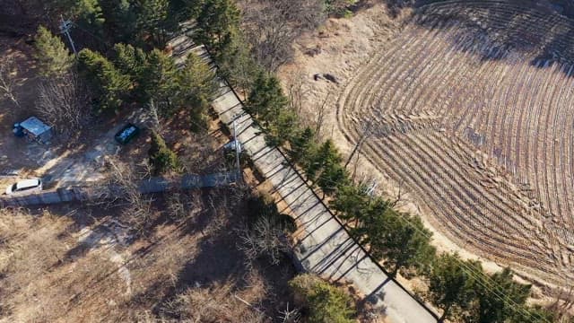 Car Driving on a Country Road and the Parking Lot