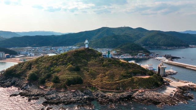 Lighthouse on a coastal hill