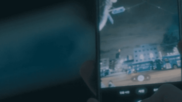 Moonlit night with street sign and smartphone