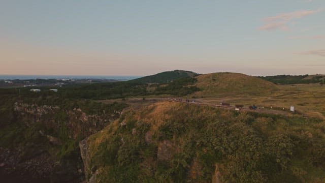 Coastal landscape with hills and ocean