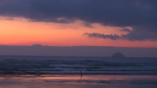 Twilight hues over a serene beachscape