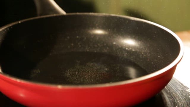 Frying Pan with Pancakes on It