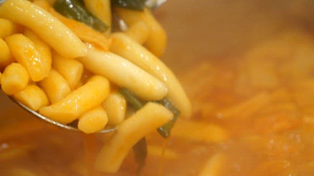 Spicy tteokbokki simmering in a pot