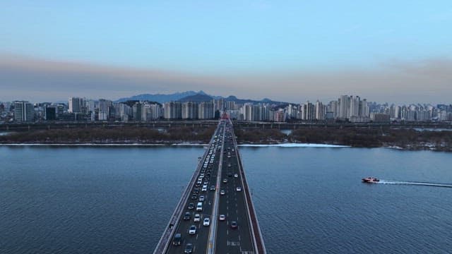 Stagnant Traffic on a Busy City Bridge in the Evening
