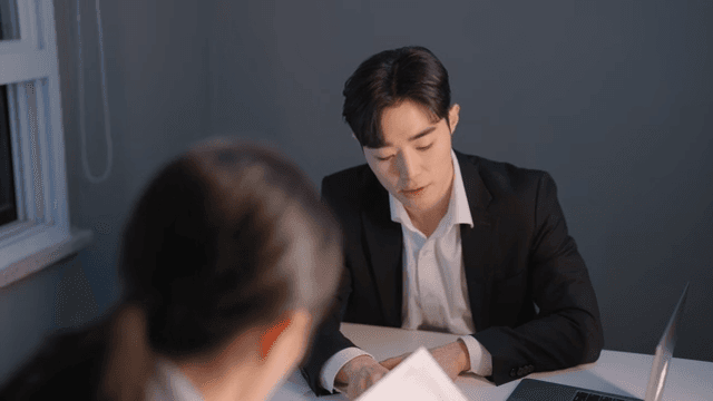 Two people having a meeting until late at night