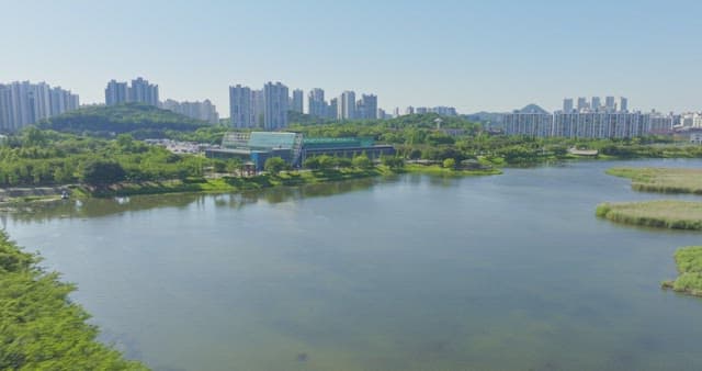 Cityscape with a park and river