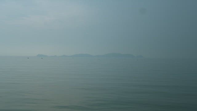 Serene ocean view on a hazy day