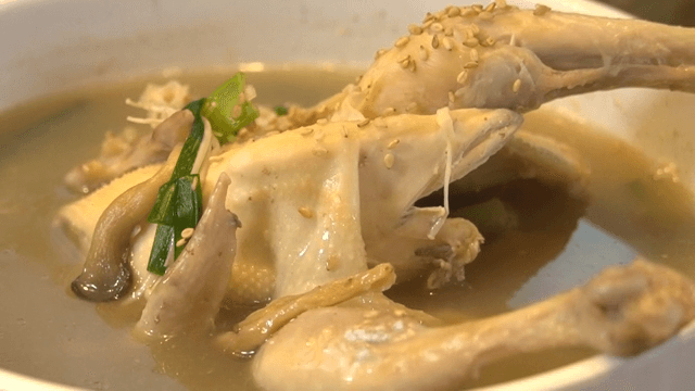 Bowl of Hot Samgyetang Sprinkled with Sesame Seeds