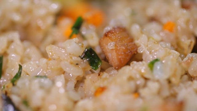 Close-up of fried rice with vegetables and meat