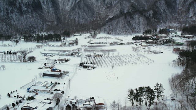 Snow-Covered Mountain Village in Winter