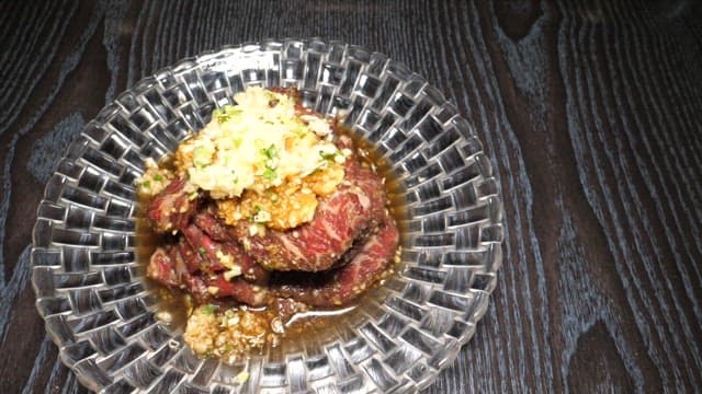 Grilling Marinated Pork Rib on a Barbecue Grill