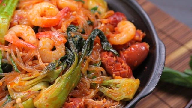 Stir-fried bok choy with red pepper paste with sausage, shrimp and glass noodles