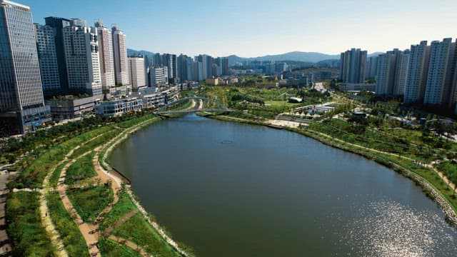 Cityscape with apartments and lake park