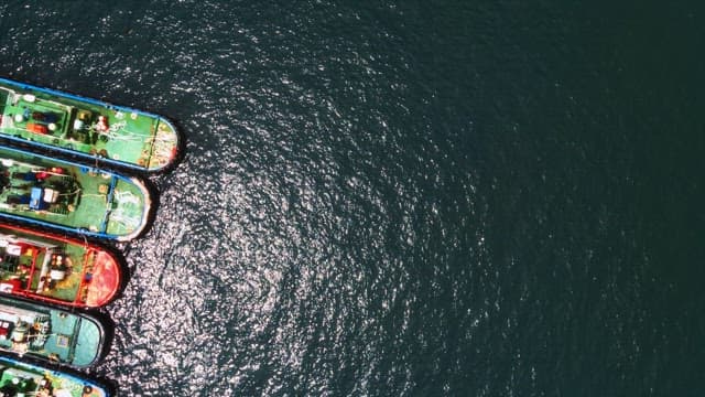 Aerial View of Cargo Ships on Serene Sea