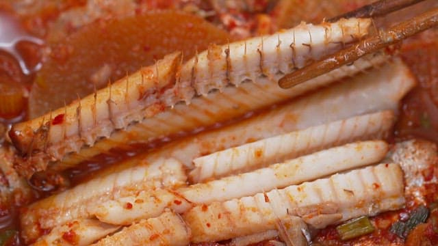 Chopstickful of deliciously cooked spicy braised hairtail