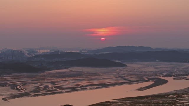 Sunset over an distant mountains