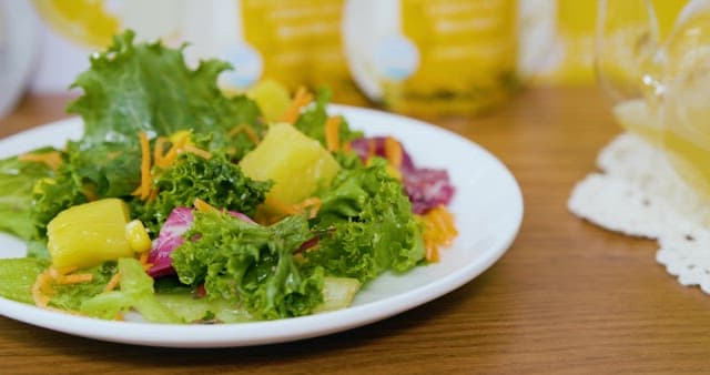 Sauce Adding Flavor to Fresh Vegetable Salad