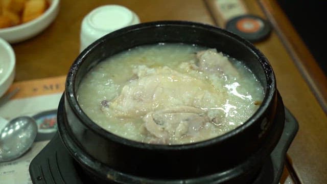 Chicken Porridge Served in a Stone Pot