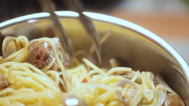 Cooking Pasta with Clams and Peppers