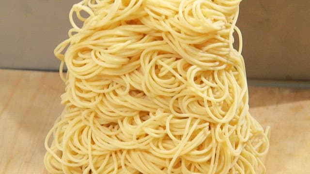 Pasta being extruded from a machine