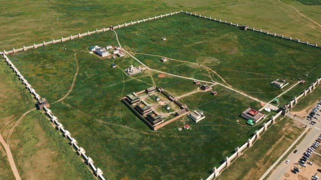 View of a historic temple in a vast field