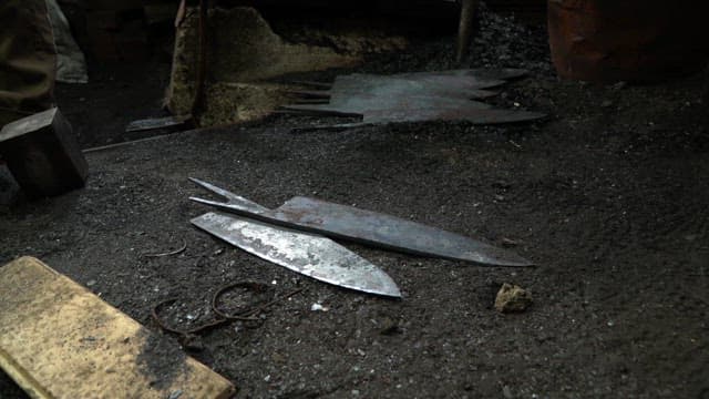 Metal blades on a workshop floor