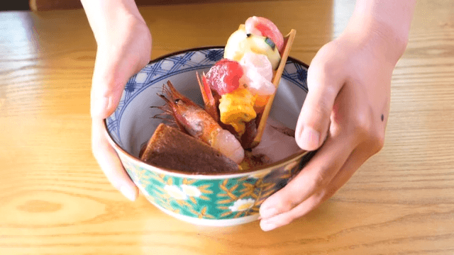 Raw fish rice bowl with colorful and fresh seafood