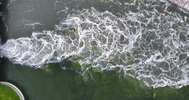Waves crashing against a rocky shoreline