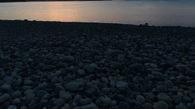 Tranquil seascape at dusk with gentle waves