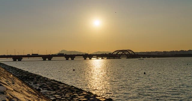 Bridge over the sea during sunset at dusk