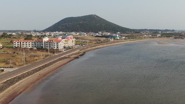 Coastal road and colorful buildings by the sea