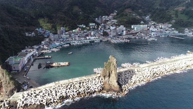 Dock with Anchored Boats in Coastal Town