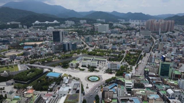 Modern Urban Square with Surrounding Buildings in Midday