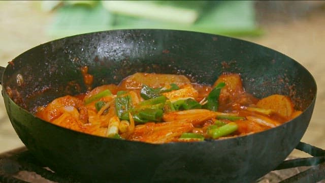 Delicious and spicy braised spicy chicken simmering in a pot